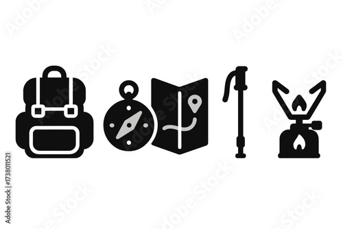 Essential hiking gear including a backpack, compass, map, trekking pole, and stove for outdoor adventures and exploration