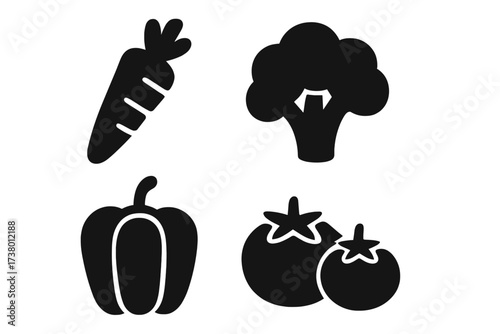 Fresh vegetables including carrots, broccoli, bell peppers, and tomatoes arranged on a clean background for healthy eating