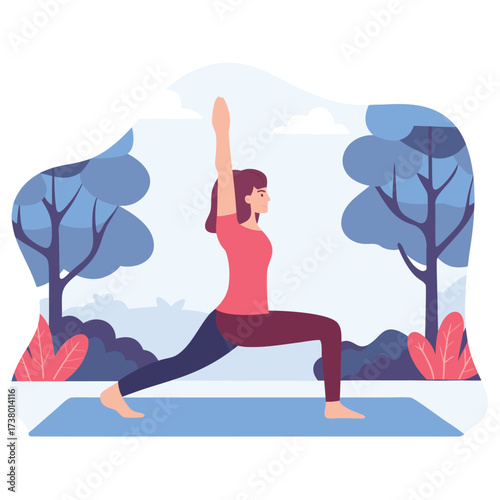 Woman practicing yoga warrior pose outdoors in a park setting