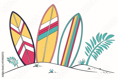 Colorful surfboards on a sandy beach with tropical leaves