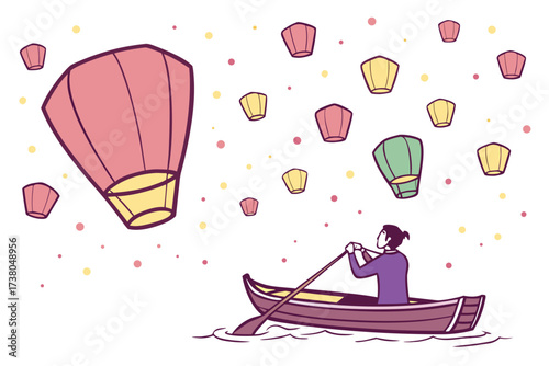 Person rowing boat under floating lanterns festival