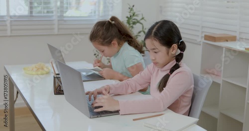 two girl study online on the laptop in the classroom 4k video.