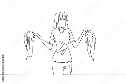 Continuous one line drawing a woman in casual clothes holding 2 wigs. Confused between two good choices. Stunning and different. National Wig Out Day. Single line draw design vector illustration