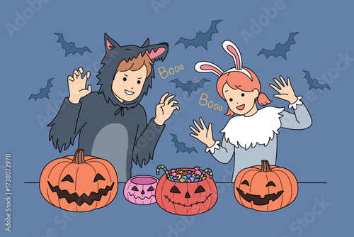 Children in colorful Halloween costumes enjoy fun with pumpkins and plenty of candies