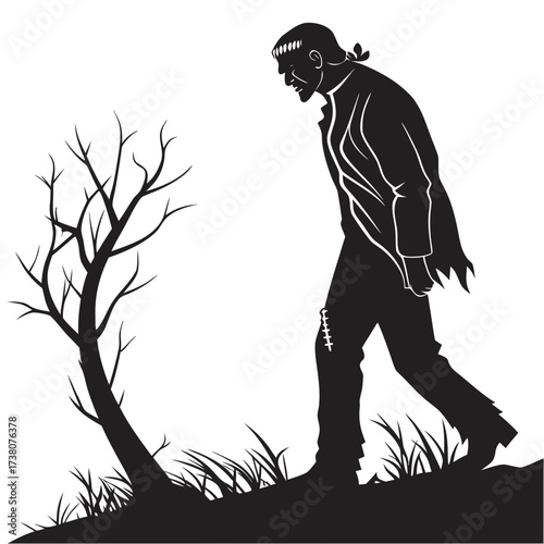 Silhouette of Frankenstein's monster walking near a bare tree