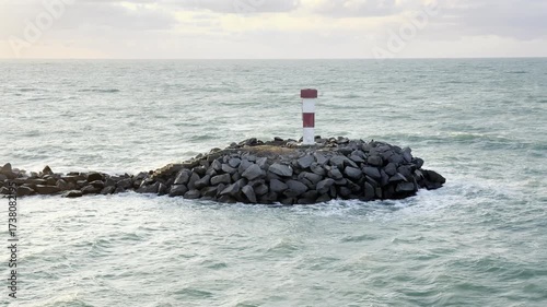 lighthouse on the coast. entrance to the port