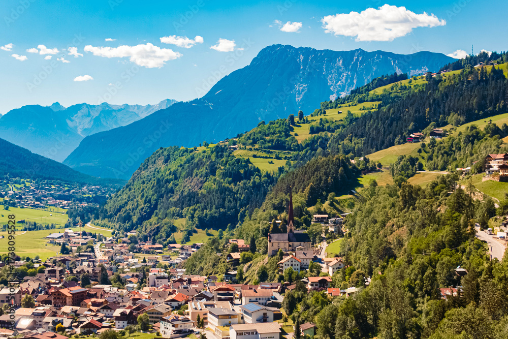 Fototapeta premium Alpine aerial summer view with a church of Oetz, Oetztal valley, Tyrol, Austria