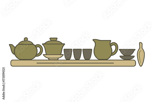 Elegant traditional Asian tea ceremony set with various utensils on a simple wooden shelf