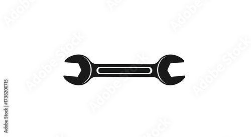 Simple black wrench icon on a white background showcases precision tools and engineering equipment