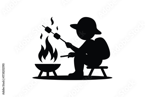 Silhouette of a person roasting marshmallows over a campfire on a summer evening