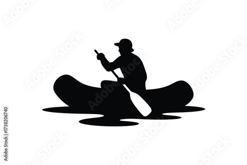 Silhouette of a person canoeing on water with paddle motion