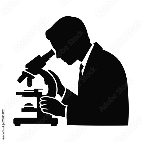 Silhouette of a scientist using a microscope for scientific research