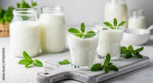 Ayran yogurt drink with mint leaves in glasses and bottles isolated PNG with Transparent Background