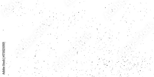 Black and white grunge texture paper with vintage paint design drops on a rough dusty wall surface backdrop