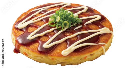 Isolated okonomiyaki pancake drizzled with sauce and mayonnaise topping of green onion food