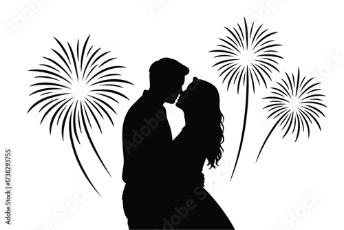 Romantic silhouette of a couple kissing amidst fireworks display