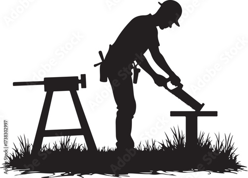 Silhouette of a carpenter sawing wood on a sawhorse