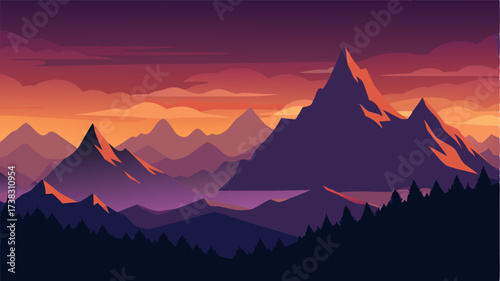 As dusk sets in the mountaintops become silhouetted against the darkening sky creating an imposing and dramatic landscape.