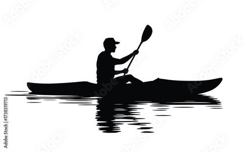 Kayaker paddling silhouette against a bright sky reflections on water