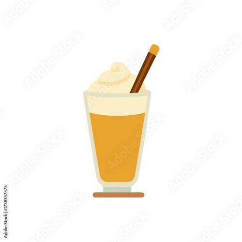 a glass of warm eggnog  garnished with a sprinkle 