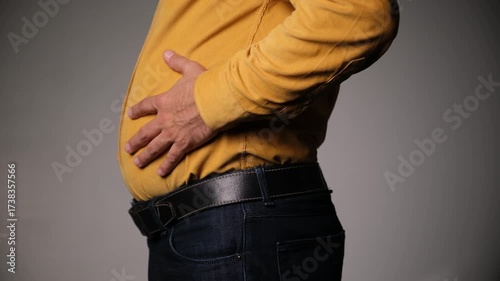 Middle-Aged Man Complaining of Abdominal Bloating