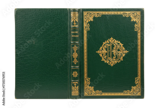 Isolated antique book with a decorated green cover and golden title on the spine edge