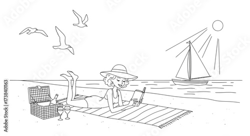 Woman reading on beach with picnic basket and sailboat in background.