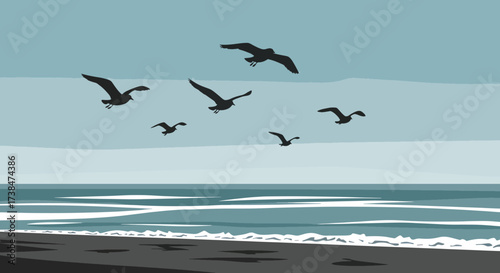 A flock of seagulls flying over the ocean waves.