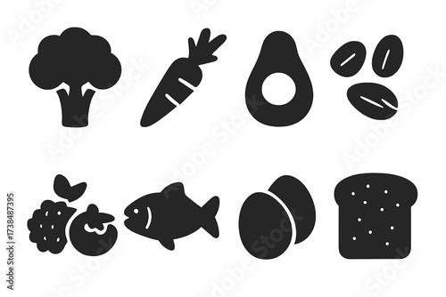 Healthy Food Icons. Solid, filled icon set of healthy food: broccoli, carrot, avocado, nuts, berries, fish, eggs, whole grain bread. Solid, filled icons in