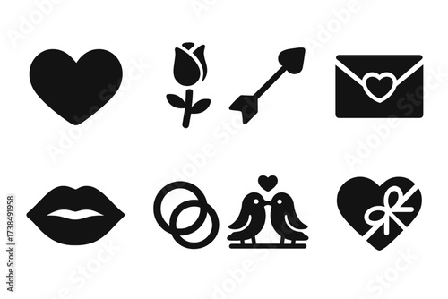 Romance Icon Set. Solid, filled icon set of romance symbols: heart, rose, cupid arrow, love letter, kissing lips, wedding rings, lovebirds, chocolate box.