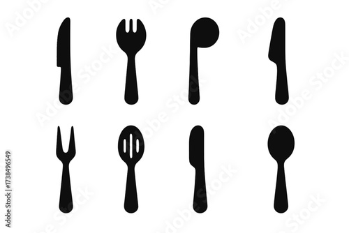 Silverware Icons Grid. Solid, filled icon set of silverware types: serrated knife, spork, ladle, pie server, cocktail fork, slotted spoon, spreader knife,