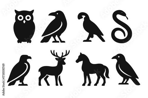 Ritual Animal Icons. Solid, filled icon set of ritual animals: owl, raven, snake, wolf, eagle, deer, horse, crow. Solid, filled icons in only black color. All
