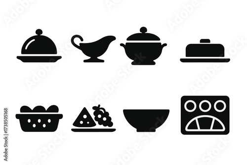 Black Serving Dishes Icons. Solid, filled icon set of serving dishes: serving platter, gravy boat, soup tureen, butter dish, bread basket, cheese tray, serving
