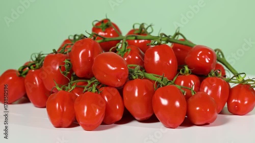 Small fresh tomatoes, slowly rotation