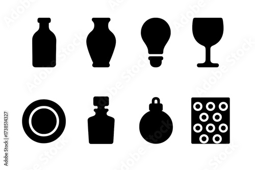 Fragile Items Icons. Solid, filled icon set of fragile items: glass bottle, ceramic vase, light bulb, wine glass, porcelain plate, crystal decanter, ornament,