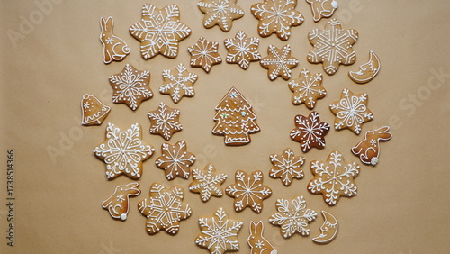 Christmas Cookies Sweet Festive Decorative Flatlay Brown Background Holiday Concept. Gingerbread Snowflakes Tree Rabbit Bell Moon White Icing Top View Arrangement