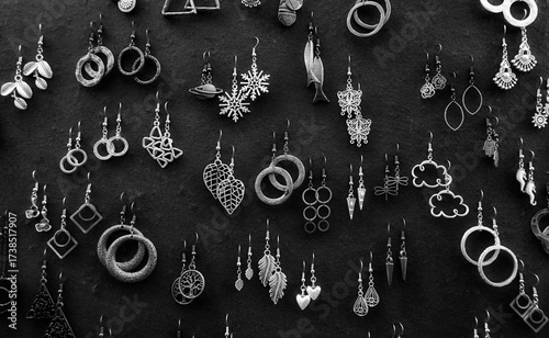 Handmade Earrings Artistic Assortment Top View Monochrome Black White Display. Stylish Jewelry Collection Various Shapes Detailed Closeup Fashion Accessories Composition