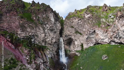 Flying over the Jily-Su Waterfall in the Caucasus in the summer