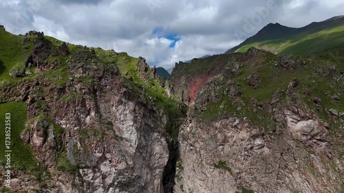 Flying over the Jily-Su Waterfall in the Caucasus in the summer