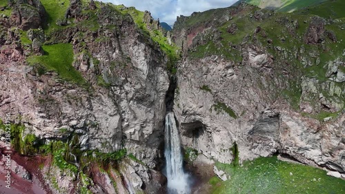 Flying over the Jily-Su Waterfall in the Caucasus in the summer