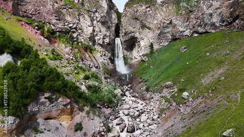 Flying over the Jily-Su Waterfall in the Caucasus in the summer