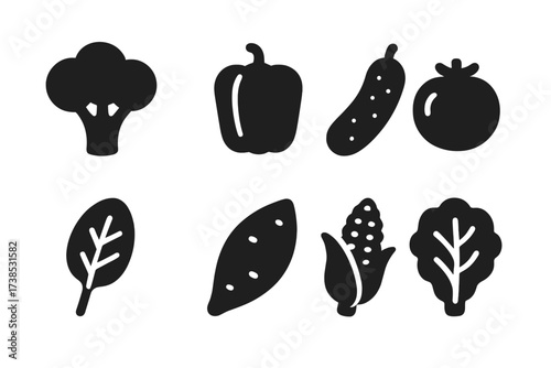 Vegan Vegetable Icons. Solid, filled icon set of vegan vegetables: broccoli, bell pepper, cucumber, tomato, spinach leaf, sweet potato, corn cob, lettuce.