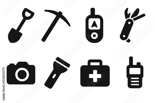 Expedition Tools Icons. Solid, filled icon set of expedition tools: shovel, pickaxe, GPS device, multi-tool, camera, torch, first aid kit, walkie-talkie.