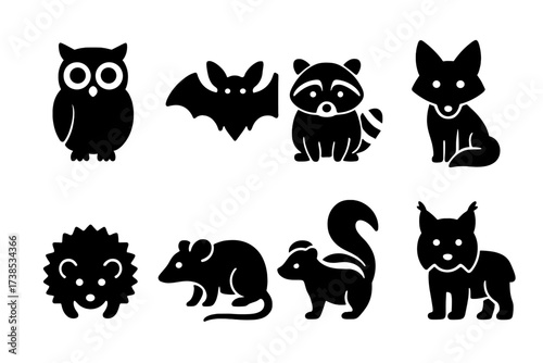 Nocturnal Animal Icons. Solid, filled icon set of wildlife nocturnal animals: owl, bat, raccoon, fox, hedgehog, possum, skunk, lynx. [Line icons in only black