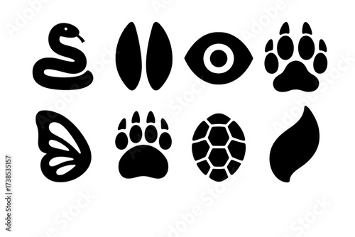Healing Animal Icons. Solid, filled icon set of healing animals: snake coil, deer hoof, owl eye, wolf paw, butterfly wing, bear claw, turtle shell, fox tail.