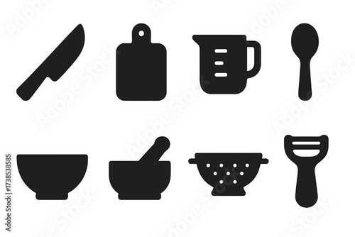 Kitchen Tool Icons. Solid, filled icon set of kitchen food preparation tools: knife, cutting board, measuring cup, measuring spoon, mixing bowl, mortar and