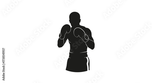 Silhouette of a muscular boxer in a fighting stance ready to compete in the ring