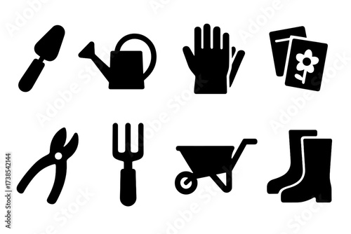 Gardening Tools Icons. Solid, filled icon set of gardening tools: trowel, watering can, gloves, seed packets, pruning shears, garden fork, wheelbarrow, garden