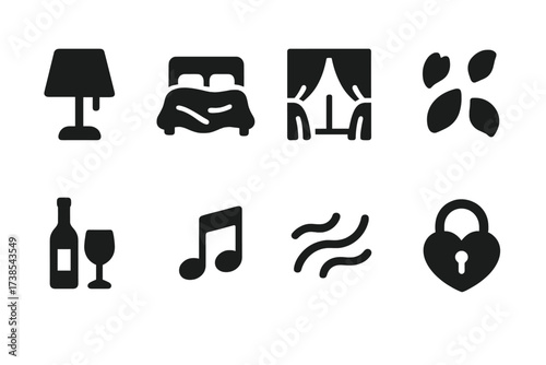 Intimate Icon Set. Solid, filled icon set of intimate ambiance: dim lamp, satin bed, drawn curtain, rose petals, wine bottle, slow music note, night breeze,