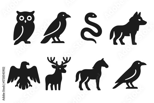 Ritual Animal Icons. Solid, filled icon set of ritual animals: owl, raven, snake, wolf, eagle, deer, horse, crow. Solid, filled icons in only black color. All